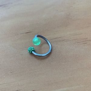 Curvy green belly button ring